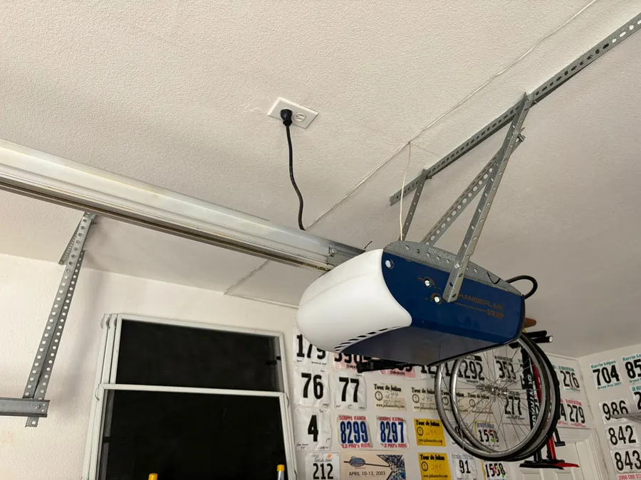 Old garage door opener before replacement in San Diego