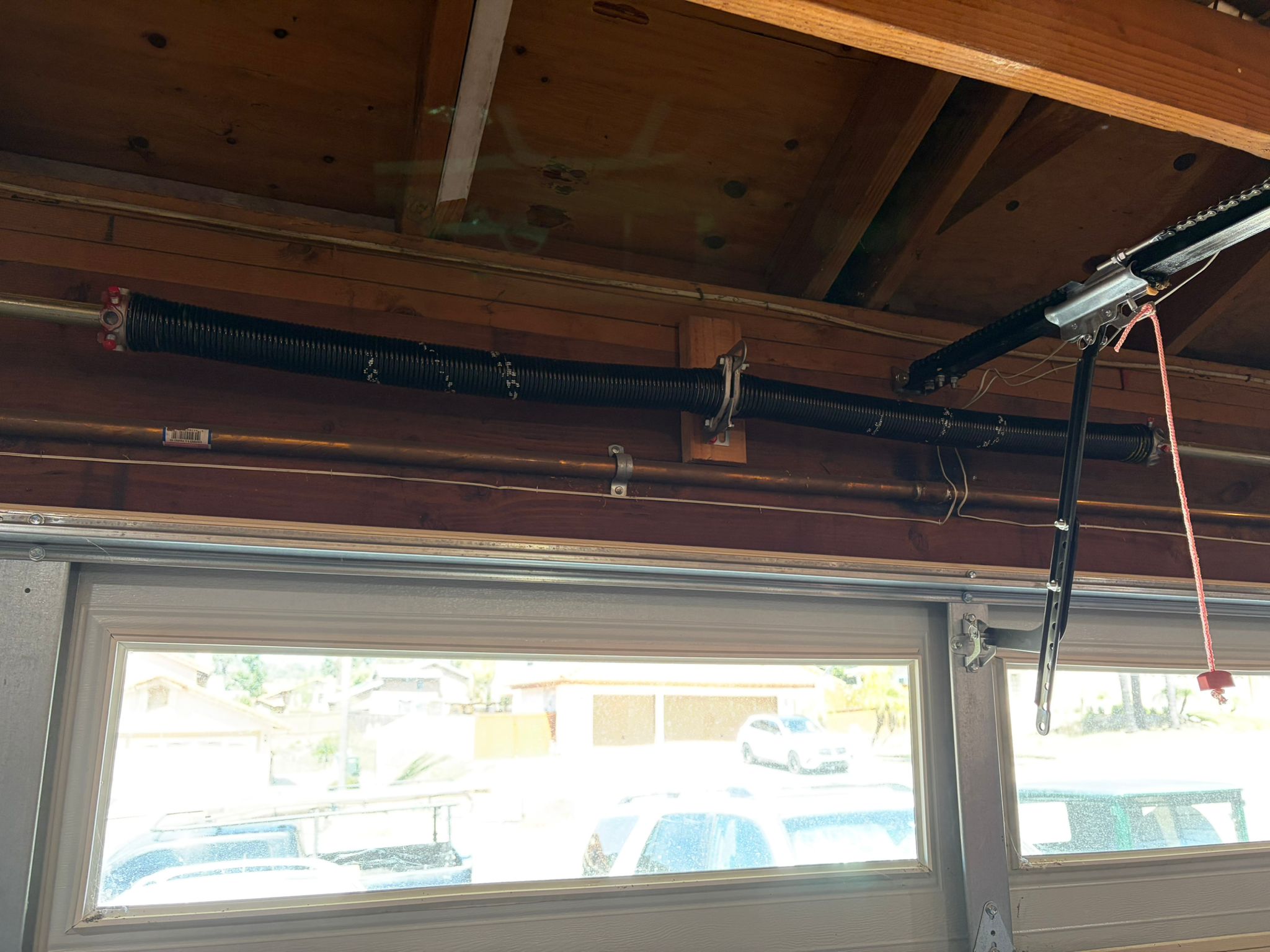 New springs installed in wooden beam garage