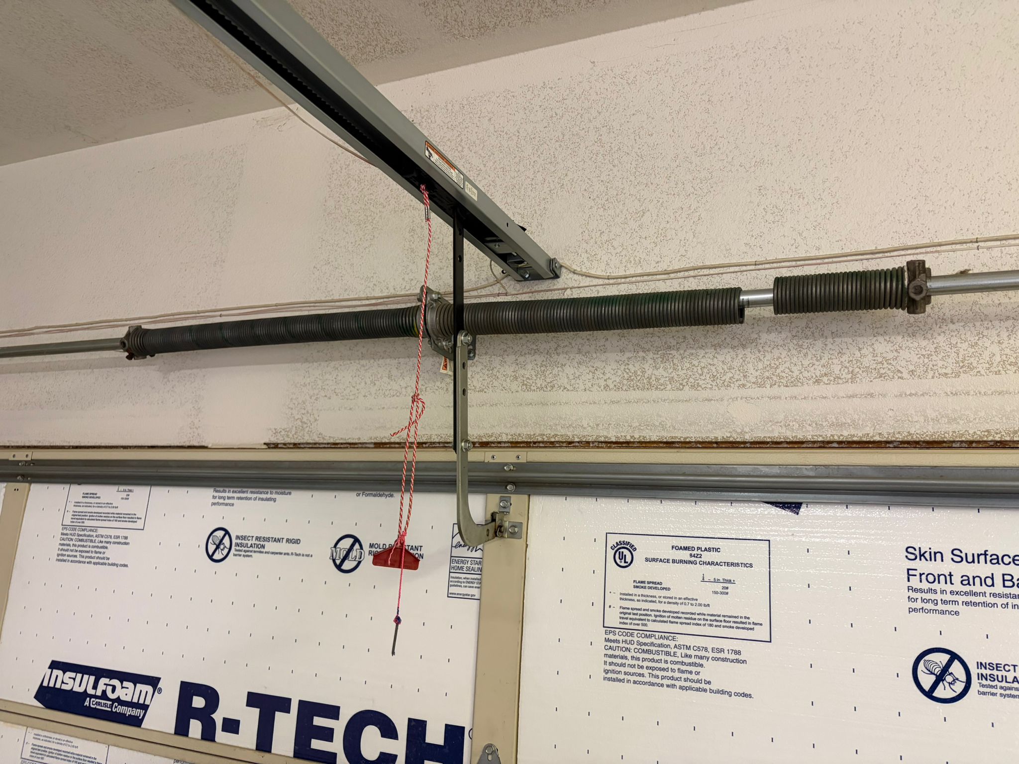 Broken single garage door spring