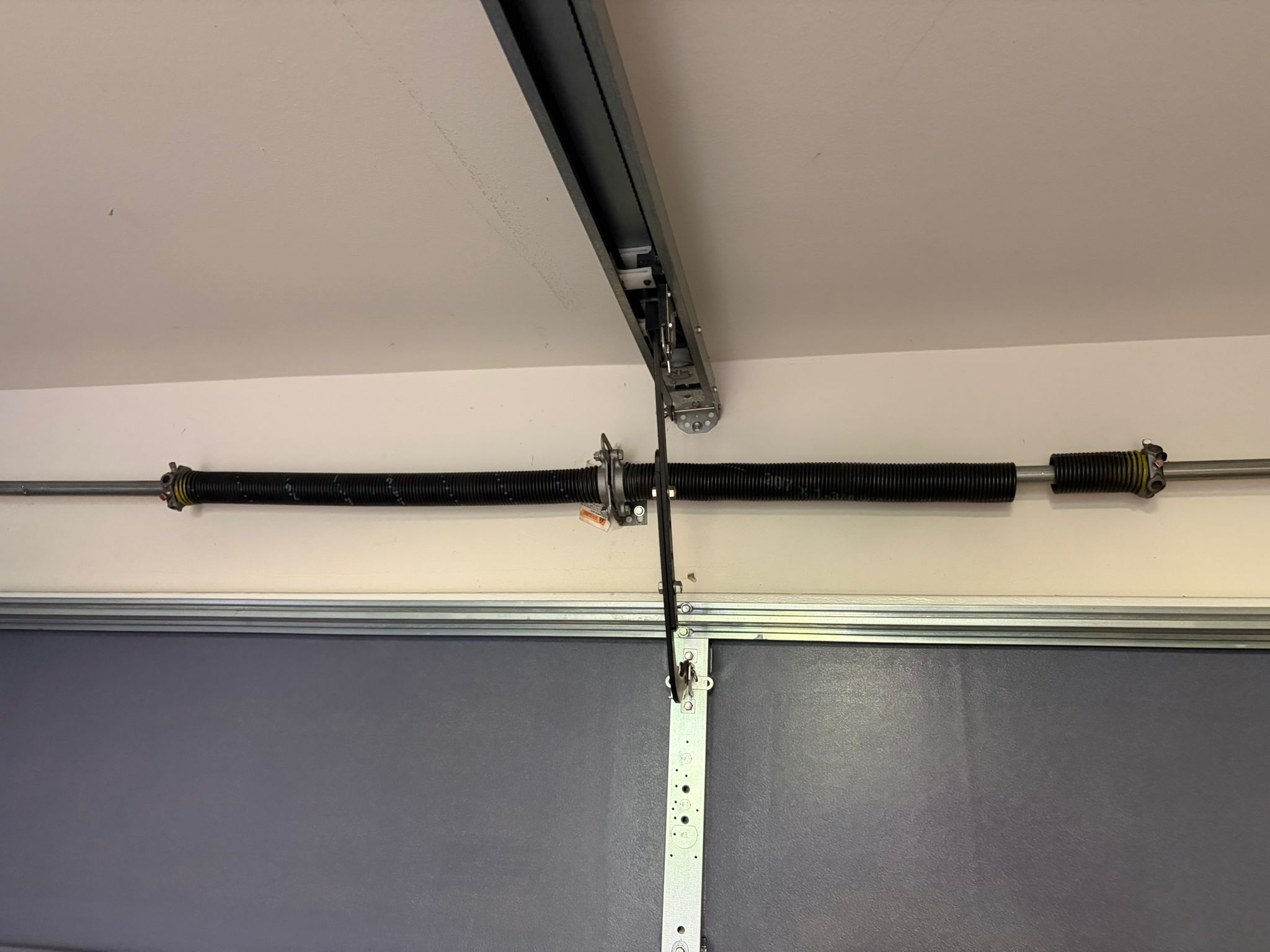 Old garage door springs before replacement
