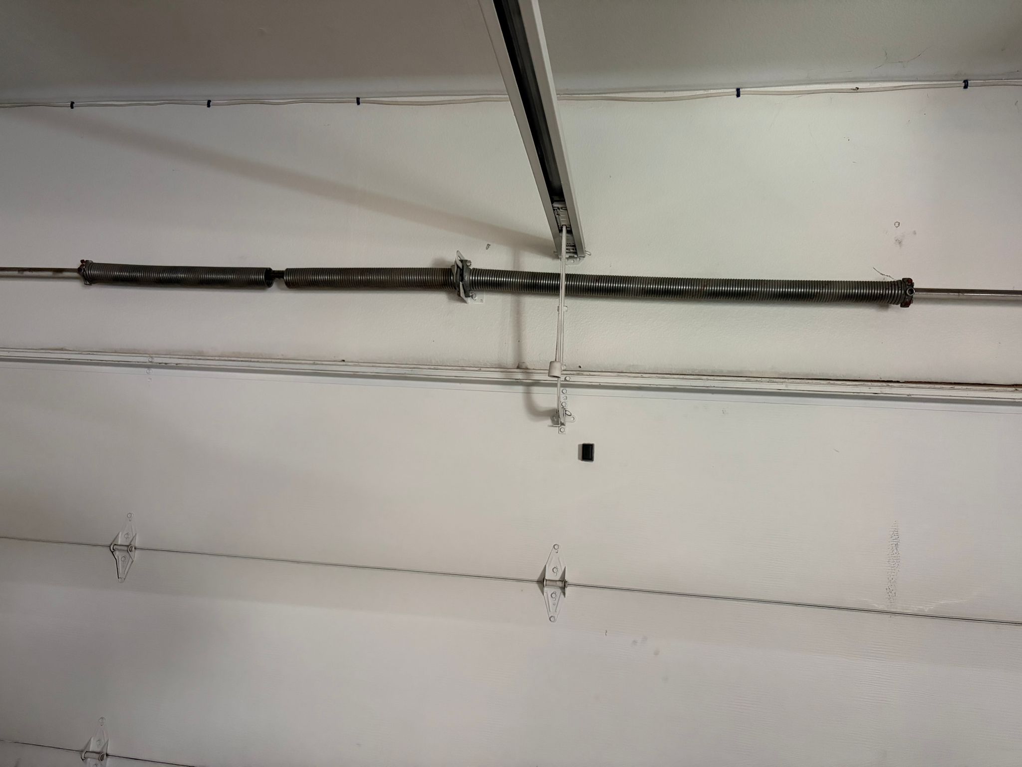 Old silver garage door springs