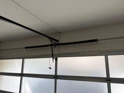 New spring on glass garage door
