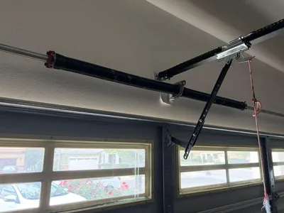 New spring installed on windowed door