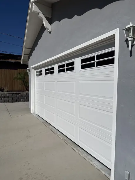 Customer photo of a white garage door from a 5-star Google review in San Diego