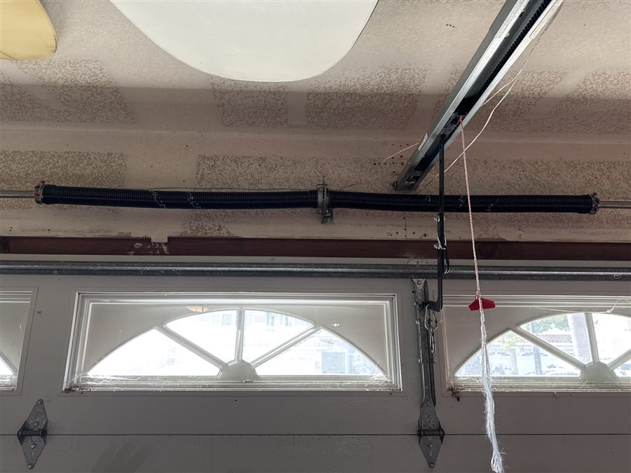 New garage door spring installed by Noah Garage Doors in San Diego