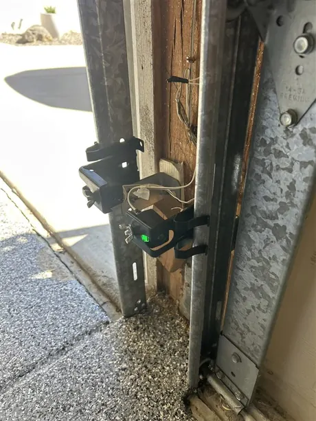 Garage door safety sensors installed by Noah Garage Doors in San Diego