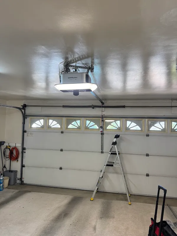 New LiftMaster garage door opener with a built-in LED light installed by Noah Garage Doors in Santee, customer photo from a 5-star Google review