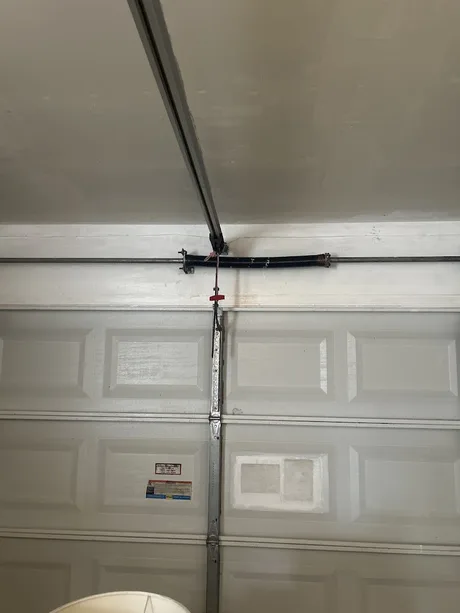 New garage door torsion spring installed by Noah Garage Doors, customer photo from a 5-star Google review