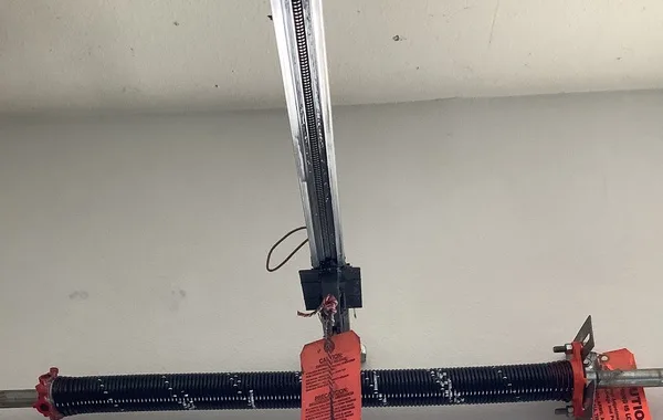 New garage door torsion spring and opener rail installed by Noah Garage Doors, customer photo from a 5-star Google review