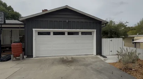 New white garage door installed by Noah Garage Doors, customer photo from a 5-star Google review